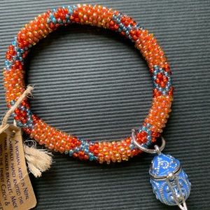 Beaded bracelet with charm